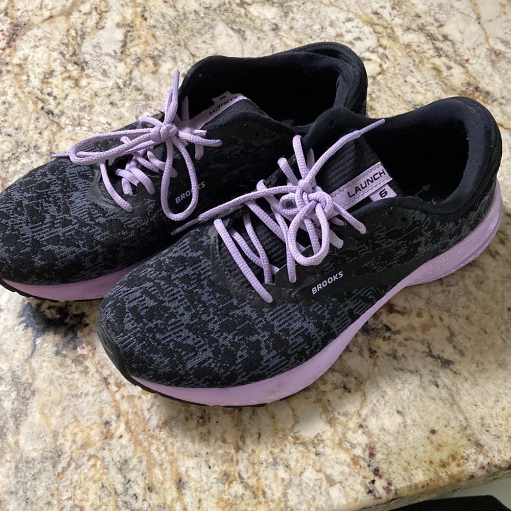 Black and purple launch 6 brooks running shoes